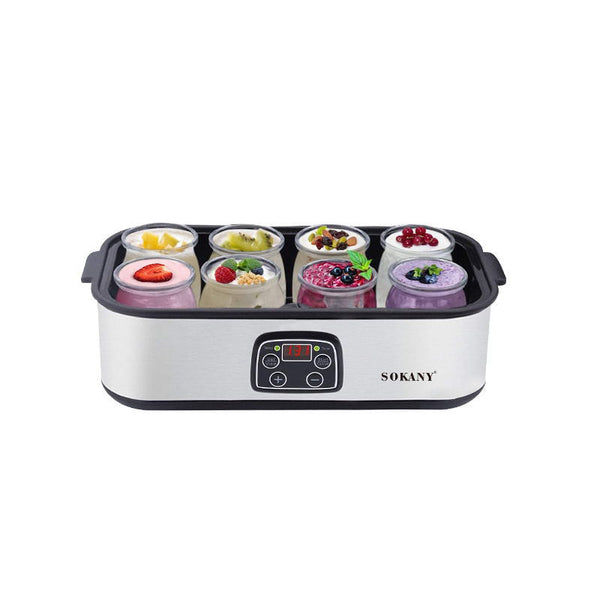 Yogurt maker filled with colorful fruit yogurts