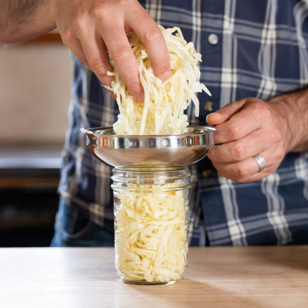 Canning Funnel with Sauerkraut