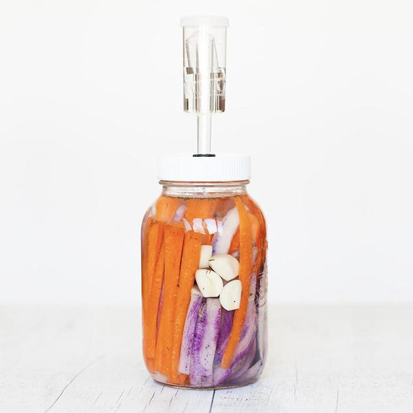 Mason jar with a fitted lid with an airlock